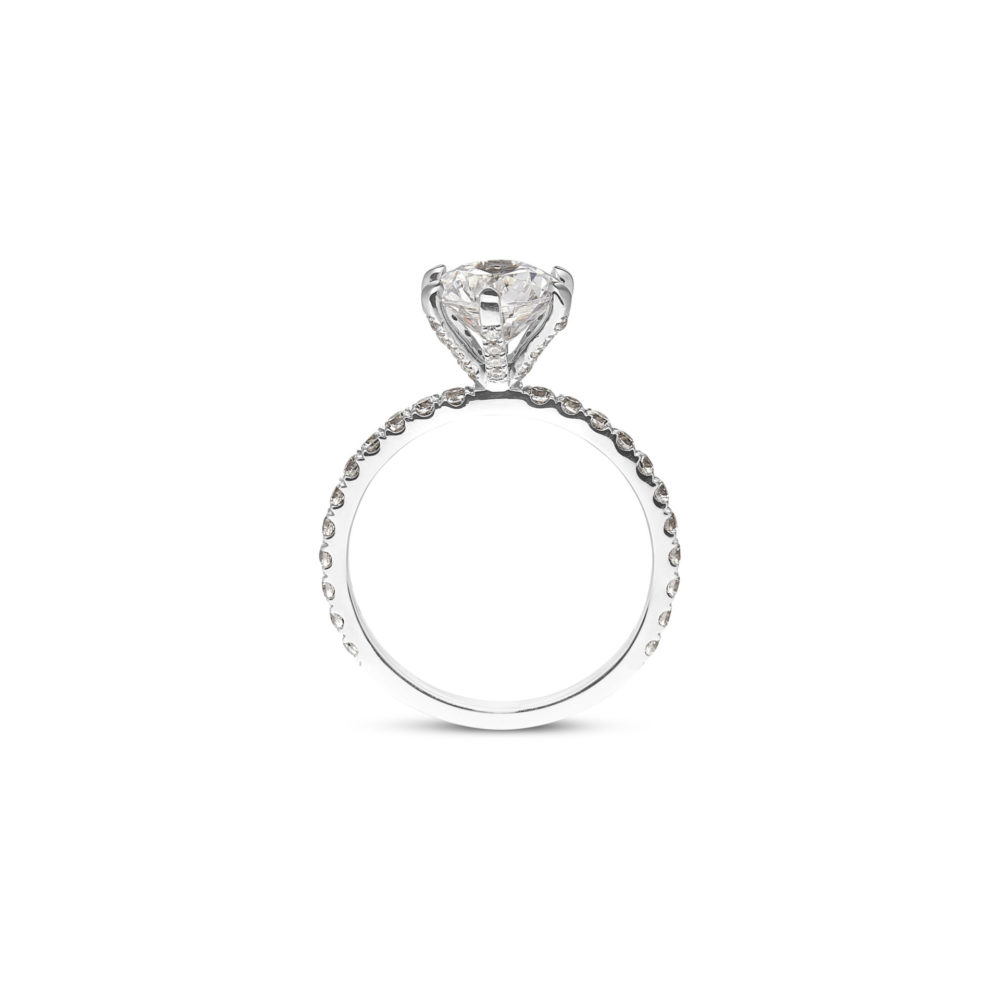 Round Solitaire Engagement Ring set on a Skinny Pave Diamond Band