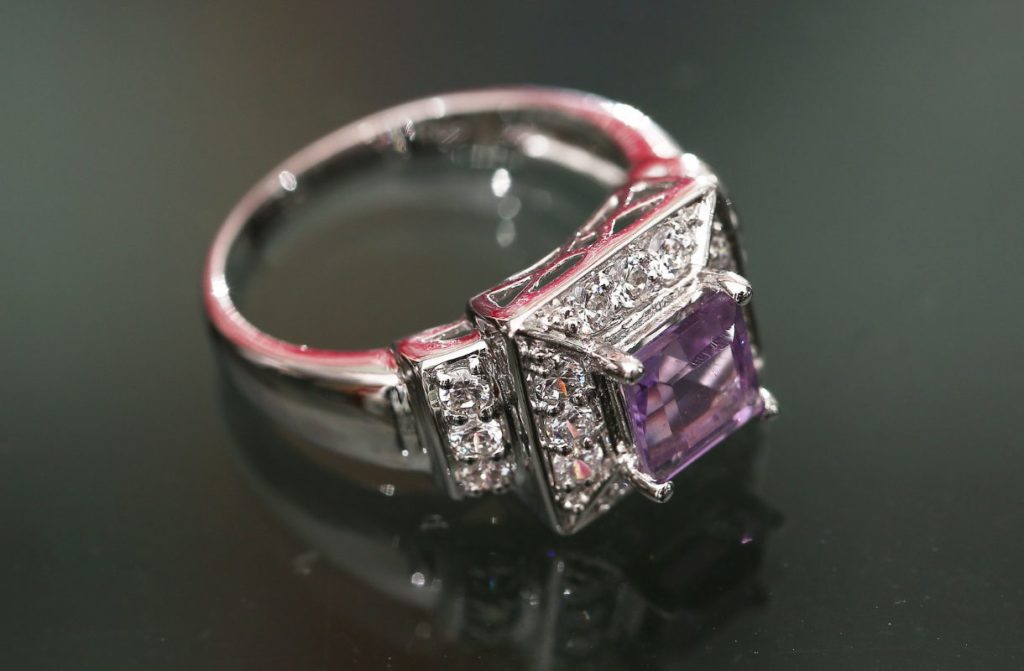 Purple gemstone diamond ring