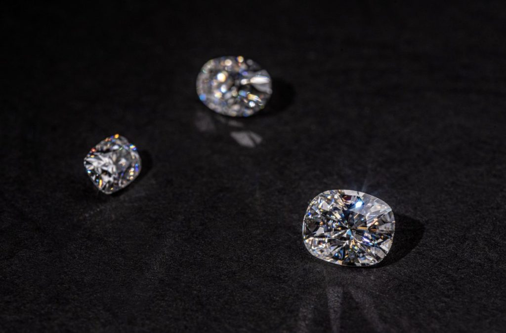 Three diamonds on a black cloth